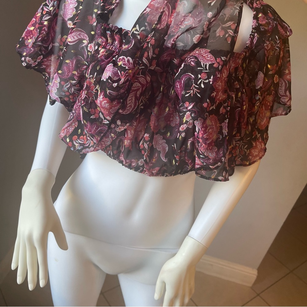 New Women’s floral top size Medium
New without tags 
Flowy top and stretchy - Picture 4 of 9
